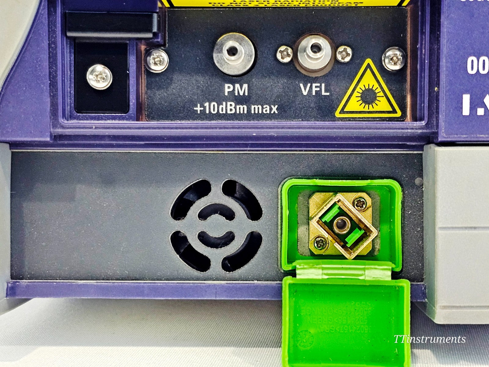 VIAVI MTS 4000 V2 close-up of PM and VFL ports with open SC-APC OTDR connector port and laser warning label