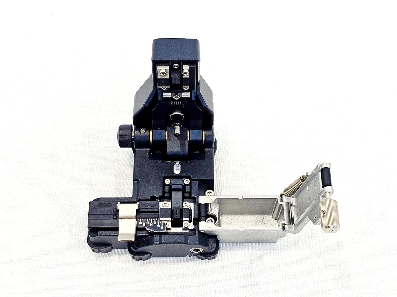 Fujikura CT-10 fibre cleaver side angle view showing blade mechanism