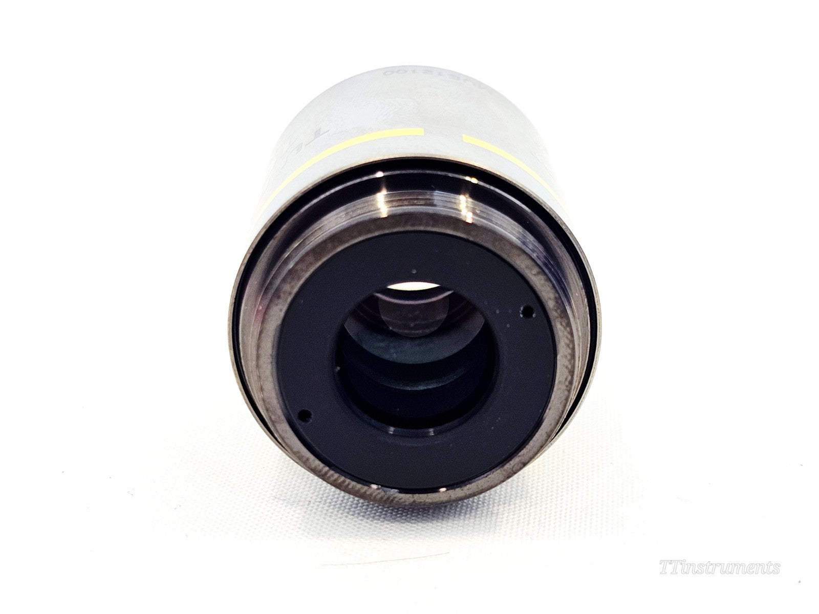 Nikon TU objective lens side view showing lens body and markings