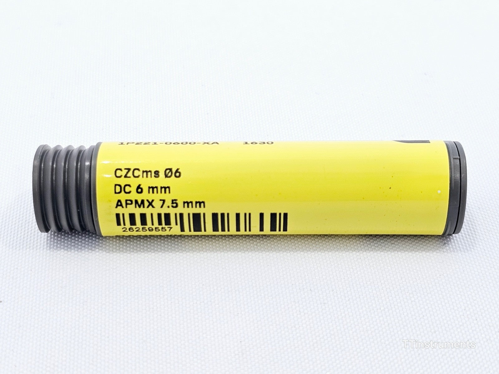 Close-up of CoroMill Plura 1P221-0600-XA 1630 tube label showing DC 6mm, APMX 7.5mm and barcode 26259557