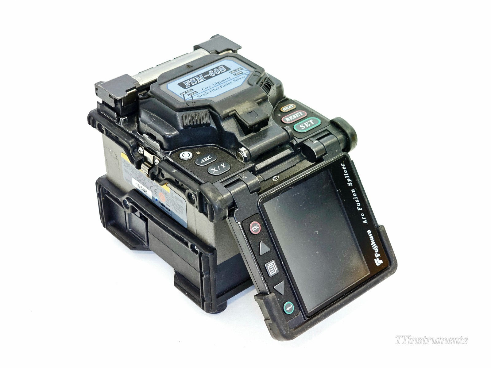 Fujikura FSM-60S fusion splicer lid open showing fibre splicing chamber and electrodes