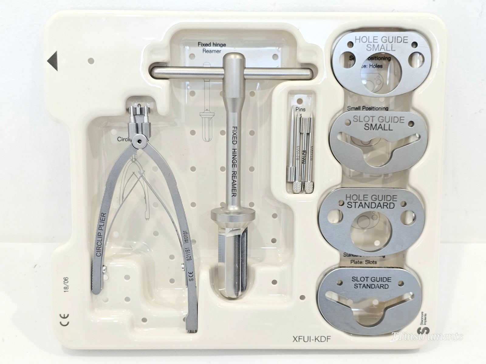 Used Stryker Stanmore orthopaedic distal femur tray showing numbered instrument catalogue labels