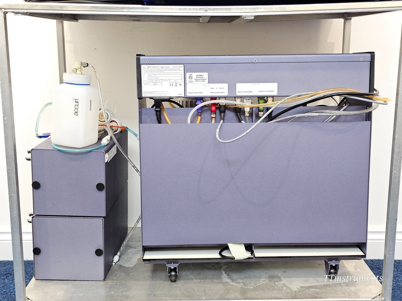 BD FACSCelesta cytometer sample injection port and tube support arm close-up detail