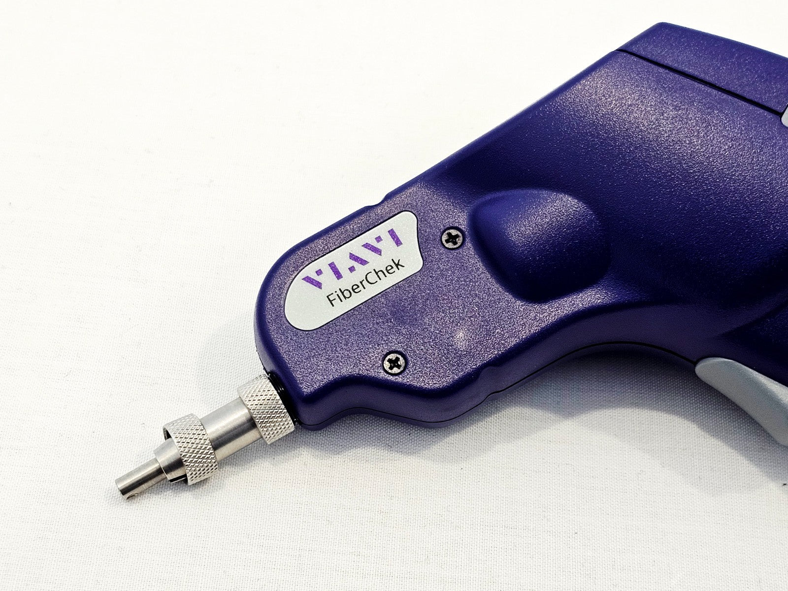 VIAVI FiberChek probe tip end close-up showing knurled adapter collar and probe tip fitted, FiberChek branding visible