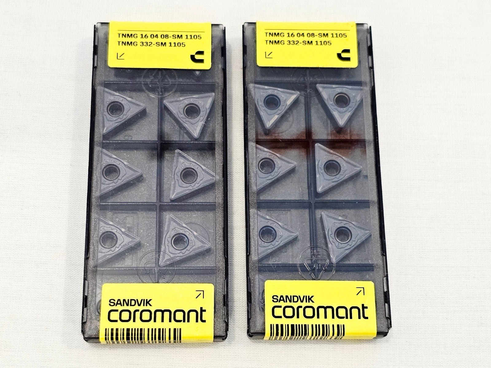Two sealed Sandvik Coromant TNMG 160408-SM 1105 insert packs, each containing 10 carbide inserts
