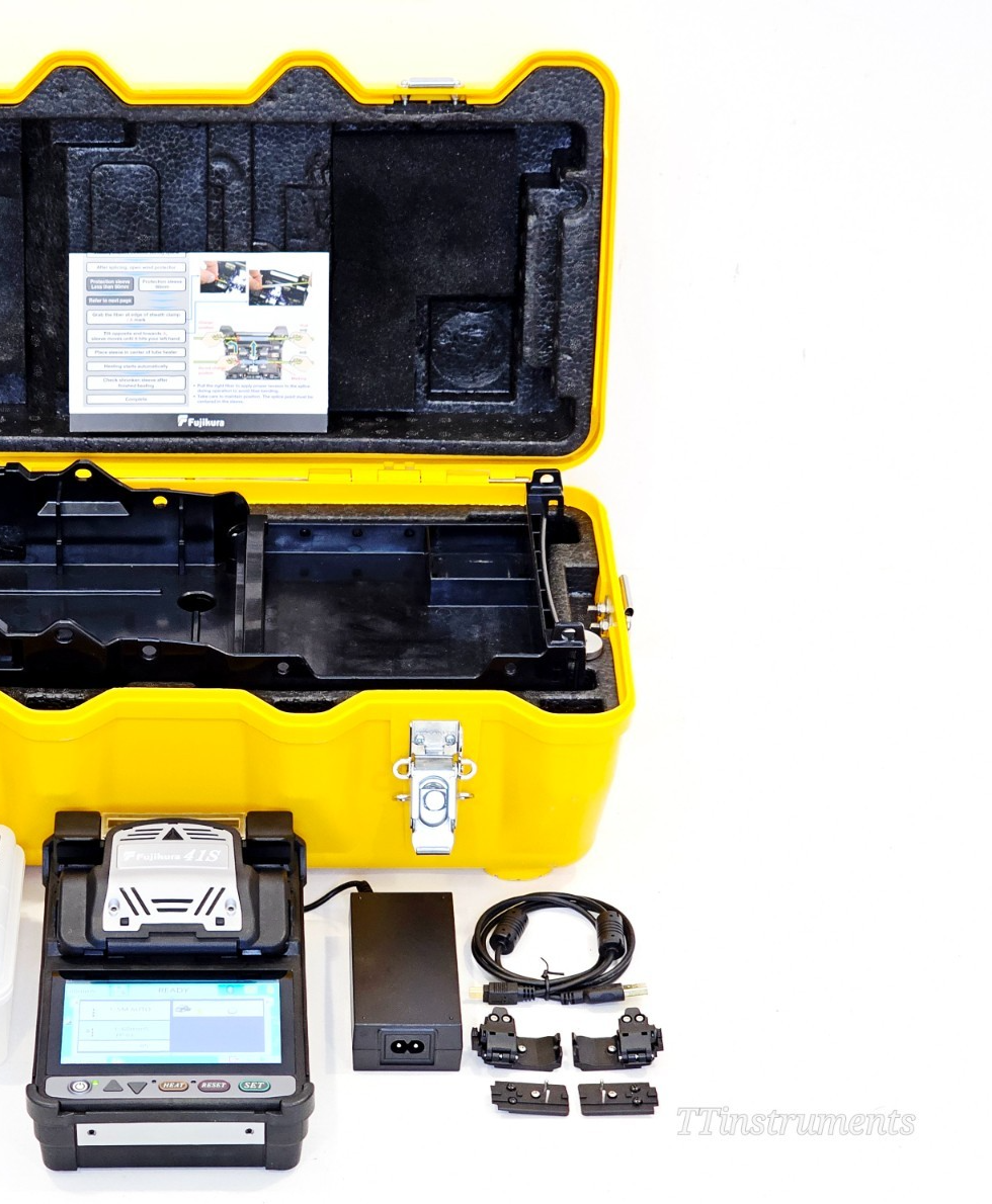Fujikura 41S fusion splicer kit with yellow hard case open, AC adapter, battery pack, fibre holder clamps