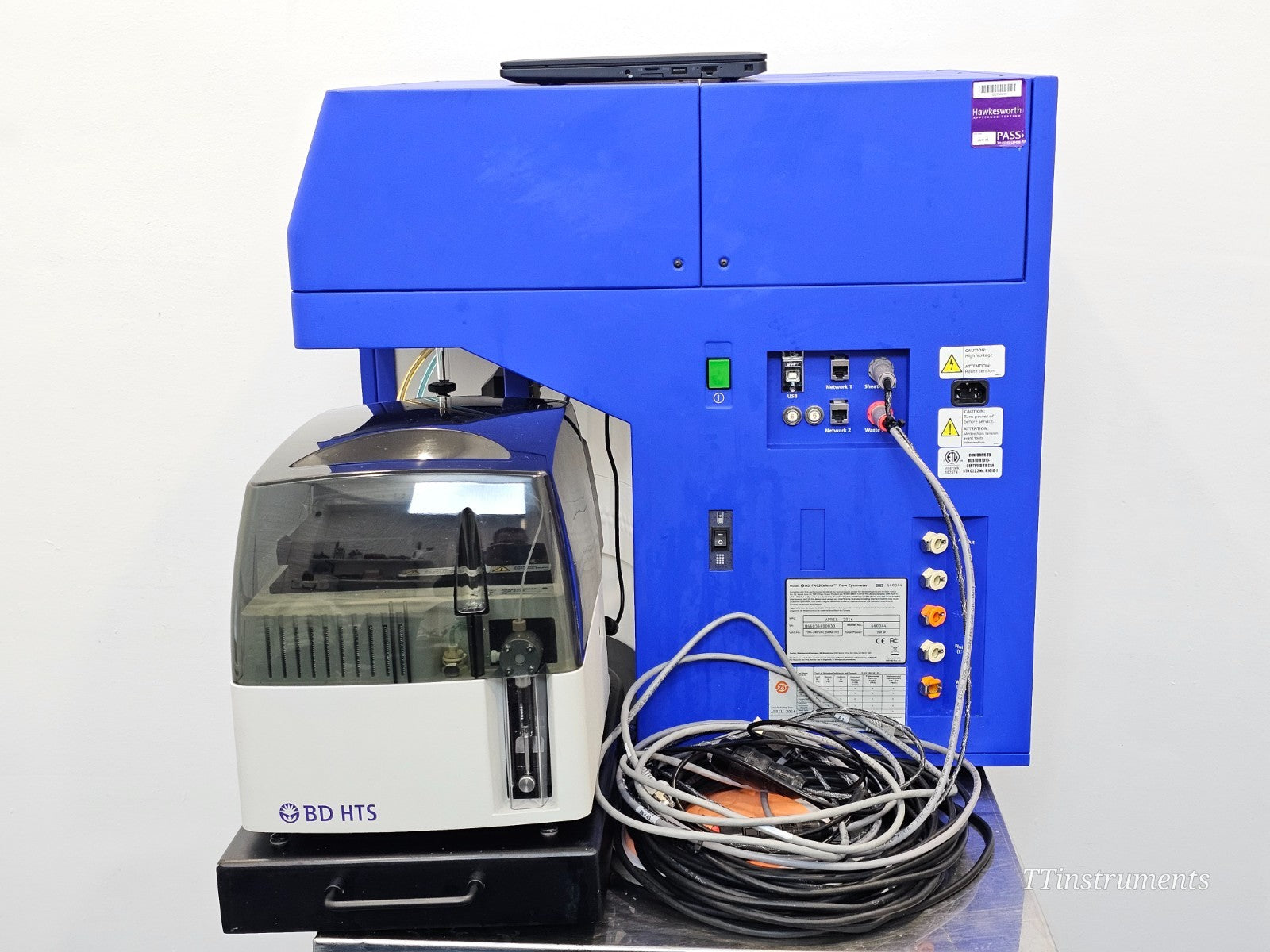 BD FACSCelesta cytometer rear panel showing fluidics connections and power interface