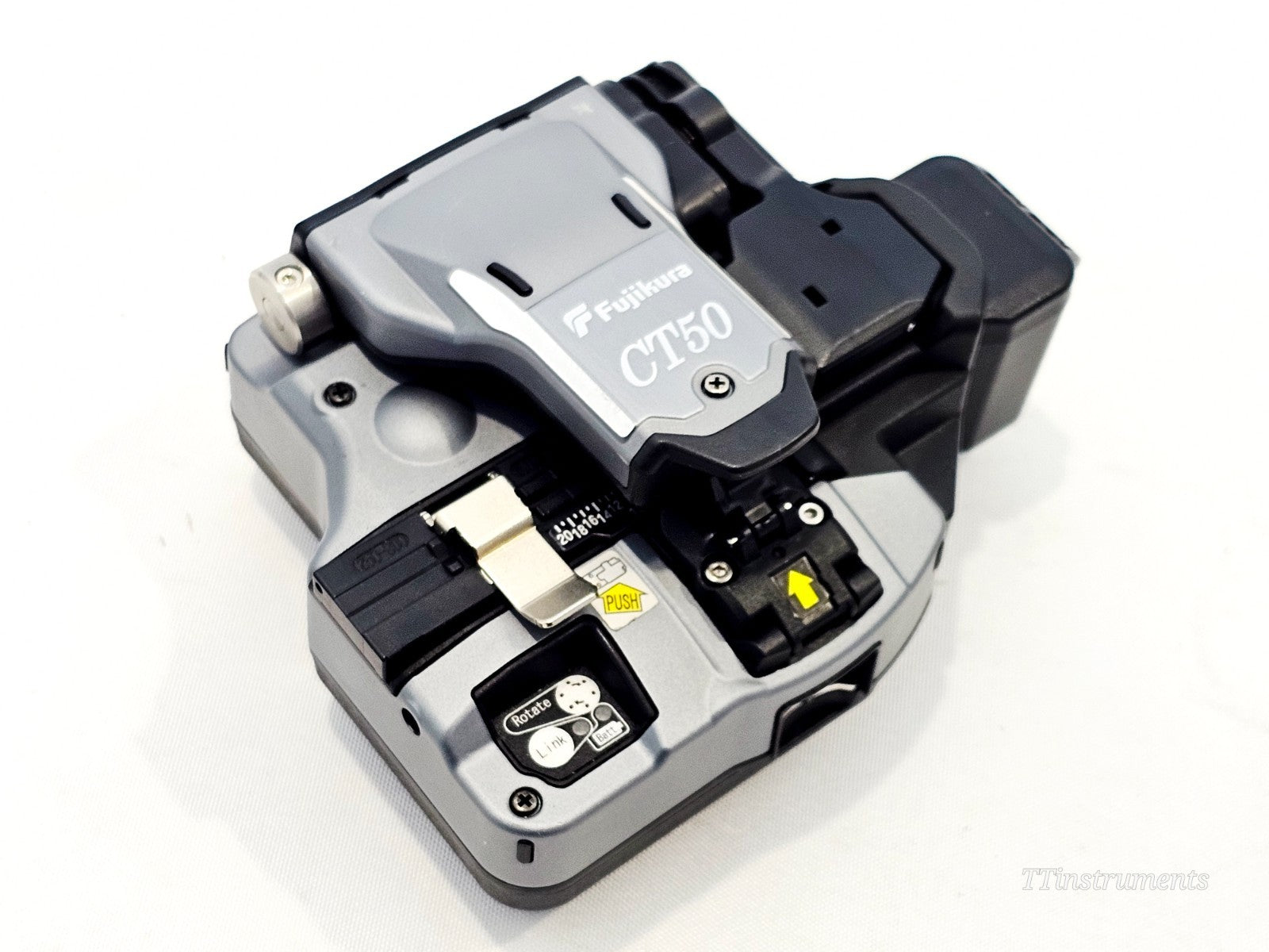 Fujikura CT50 fibre cleaver top view showing blade mechanism, clamp, fibre collector and guide plate