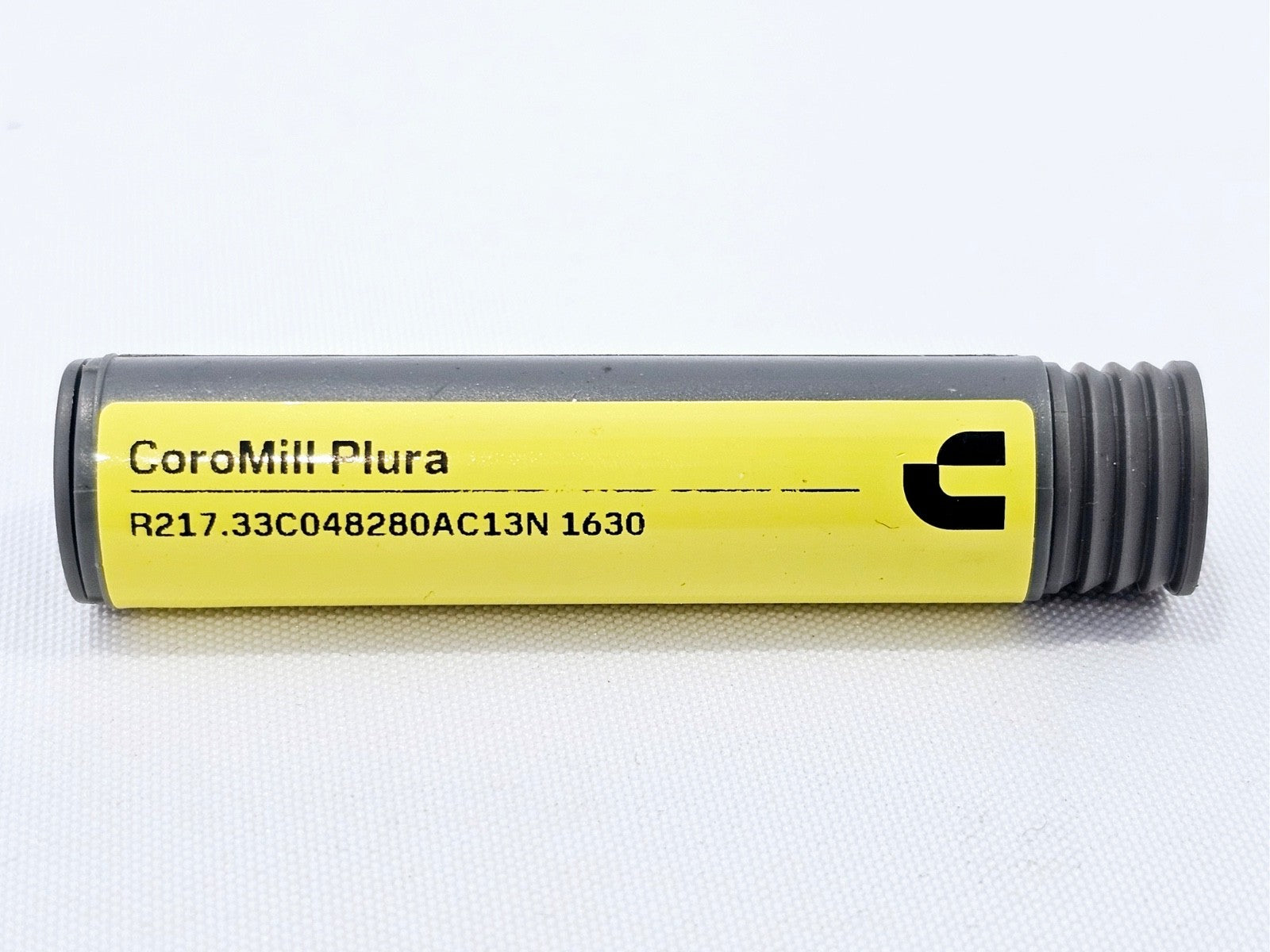 Sandvik CoroMill Plura R217.33C048280AC13N 1630 protective tube label showing product code and grade