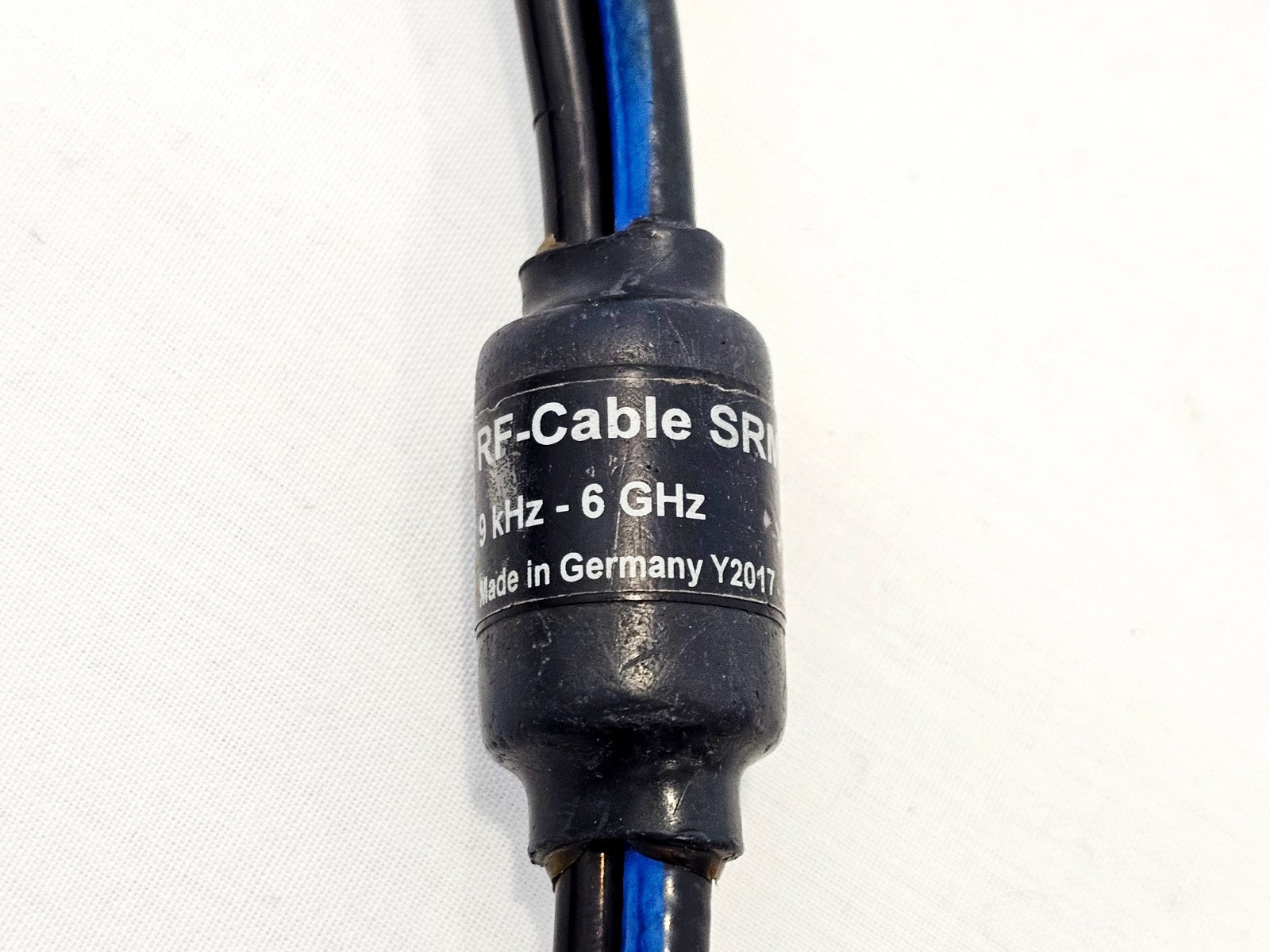 Narda RF-Cable SRM label showing 9 kHz to 6 GHz rating, Made in Germany Y2017 marking on black cable assembly