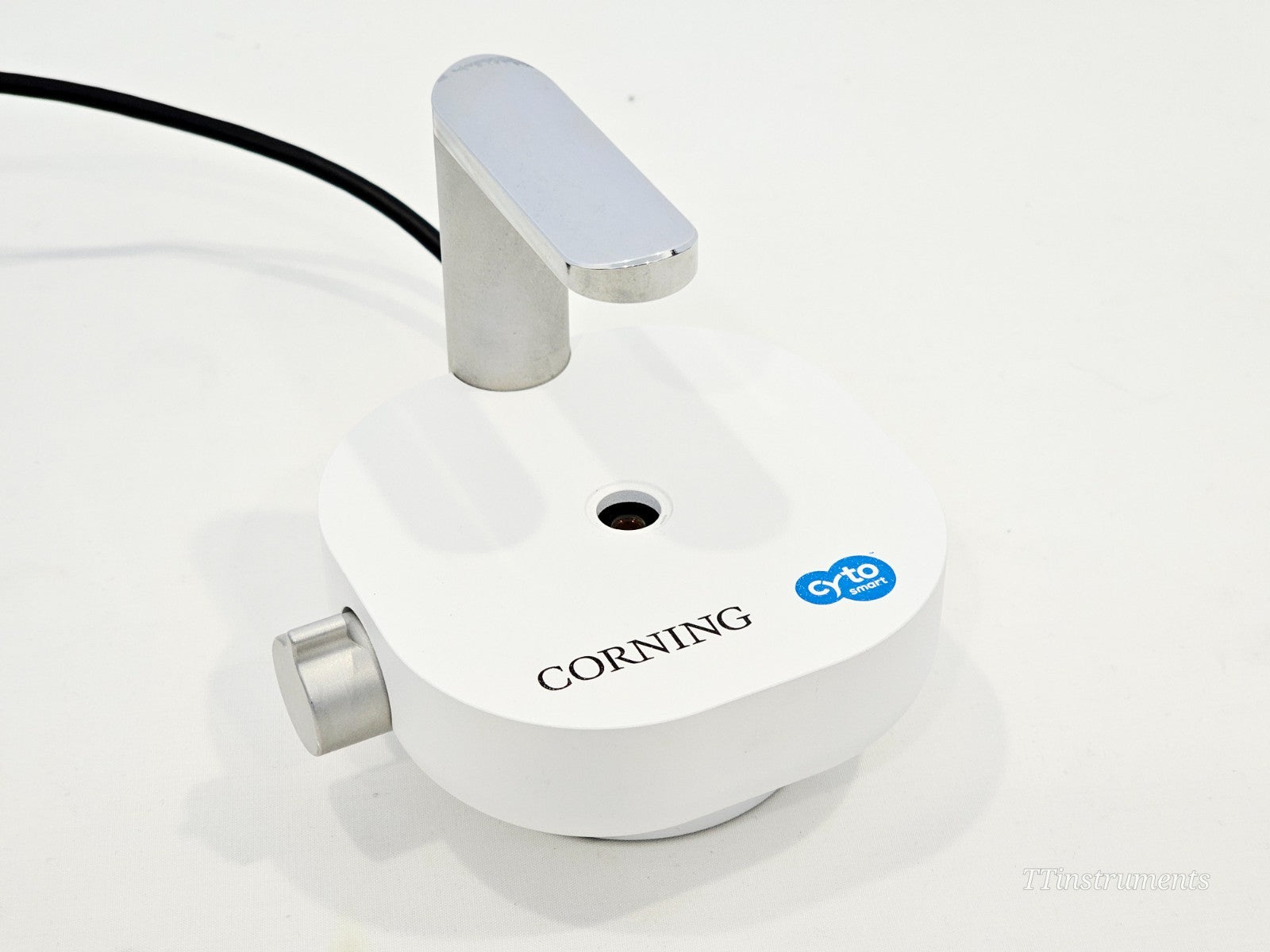 Corning CytoSMART cell counter side profile view showing compact lab instrument design