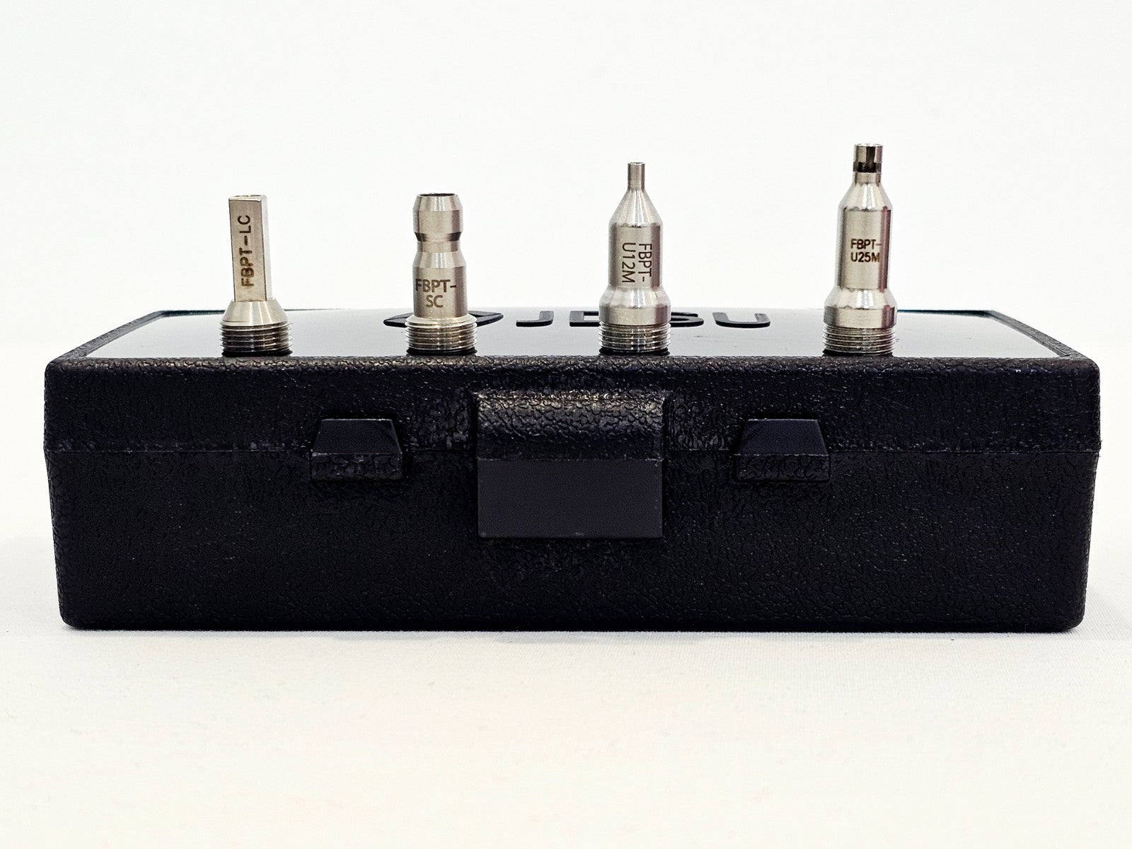 Four FBPT tips — FBPT-LC, FBPT-SC, FBPT-U12M and FBPT-U25M — displayed upright on JDSU hard storage case