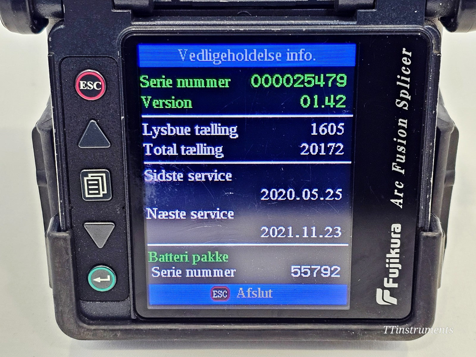 Fujikura FSM-60S splicer rear view showing battery compartment and connector ports