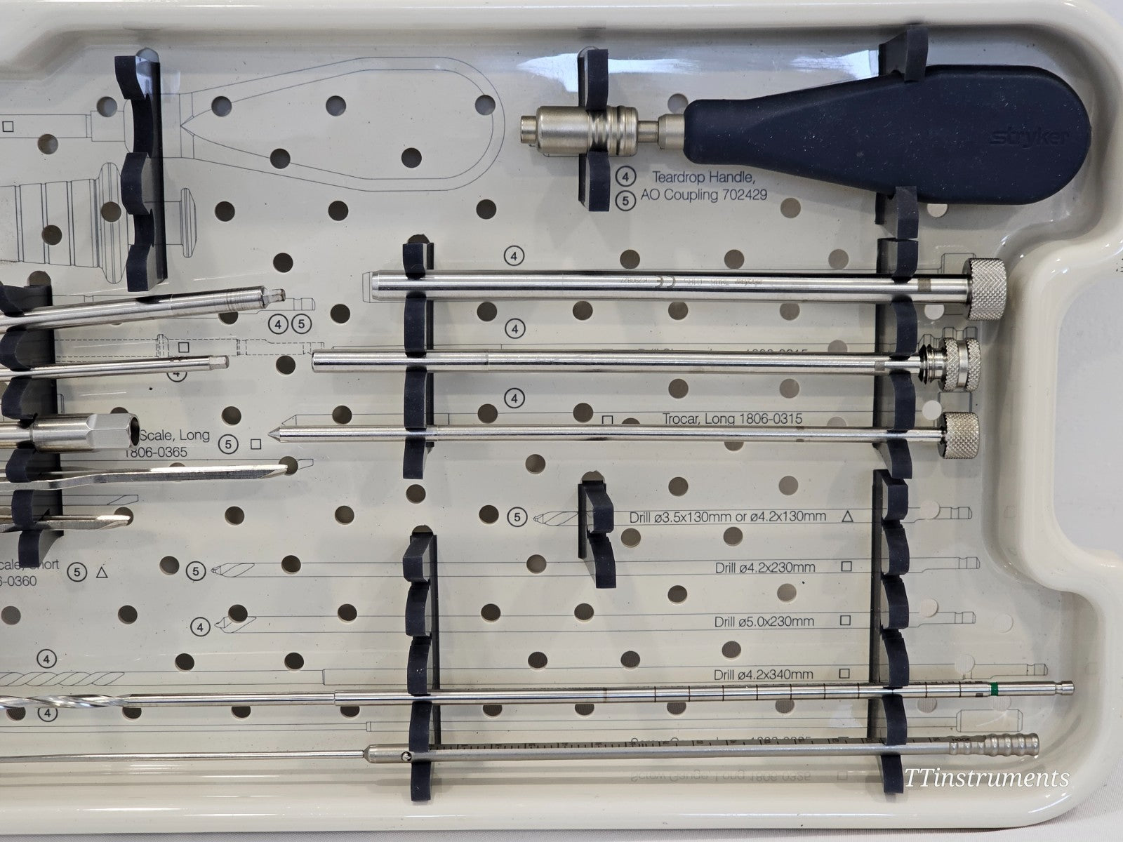 Stryker T2 tray right-side close-up showing Teardrop Handle 702429, Trocar Long 1806-0315, drill sleeves and Ø4.2x340mm drill