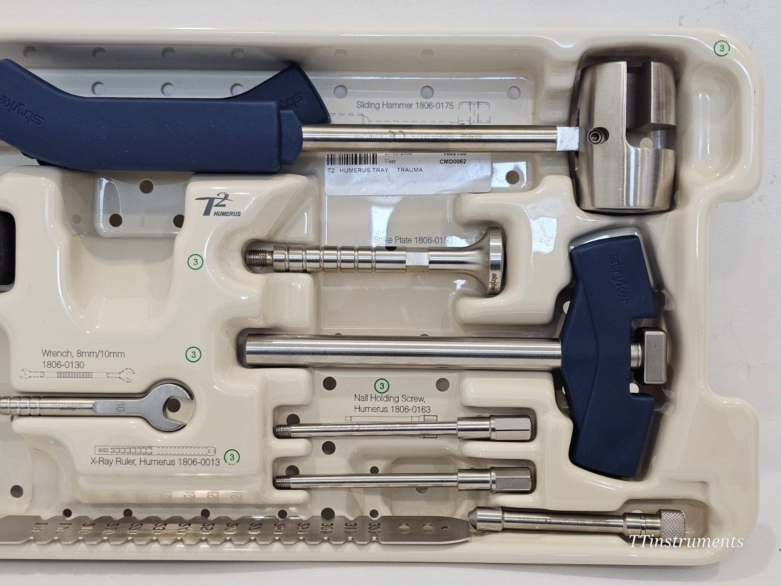 Stryker T2 Humerus Tray 2 close-up — sliding hammer 1806-0175, strike plate 1806-0150, wrench 1806-0130, nail holding screws 1806-0163 and x-ray ruler 1806-0013