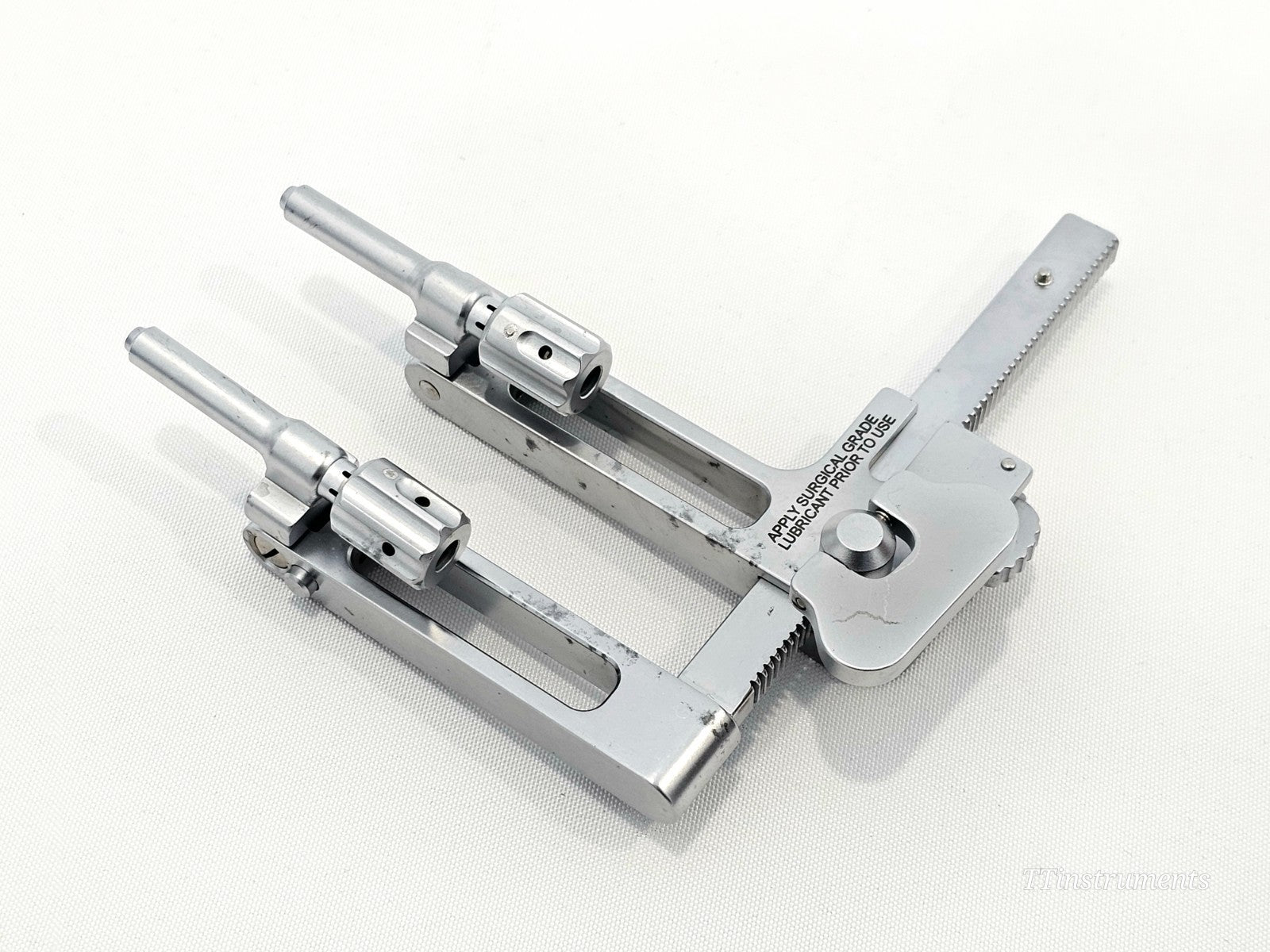 Wright Medical X-Track 5882000X overhead view showing both pin collet assemblies extended with hollow guide pins