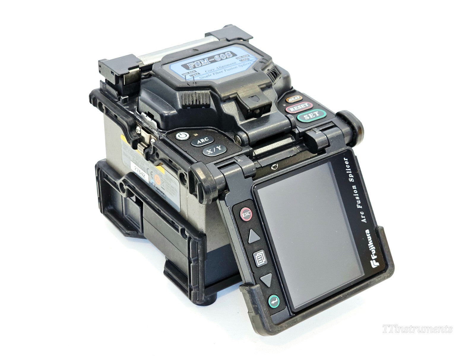 Fujikura FSM-60S fusion splicer angled side view showing lid and clamping mechanism