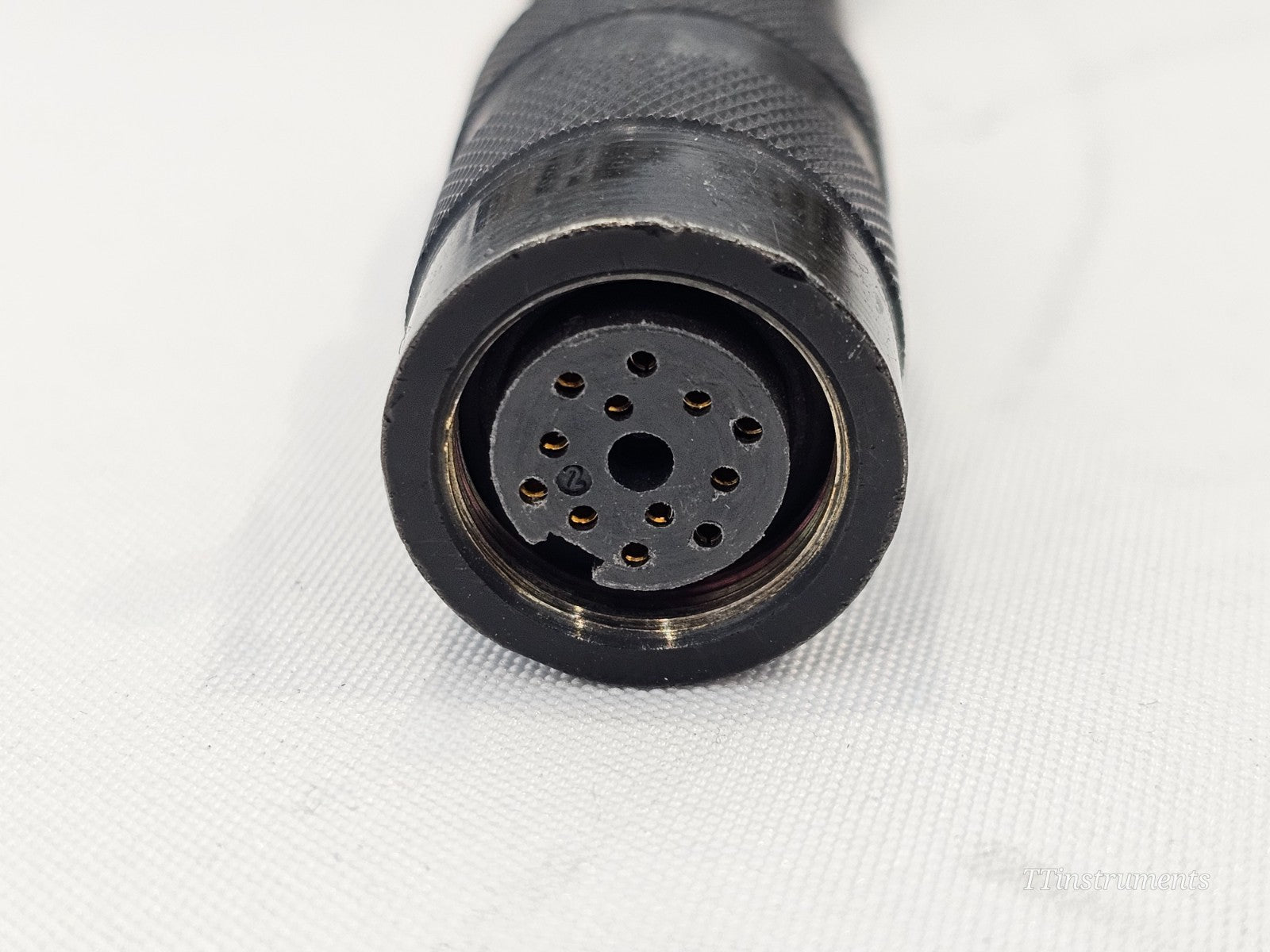 Aeroflex IFR Marconi 54311-113Y close-up of black female circular socket connector end face showing pin holes