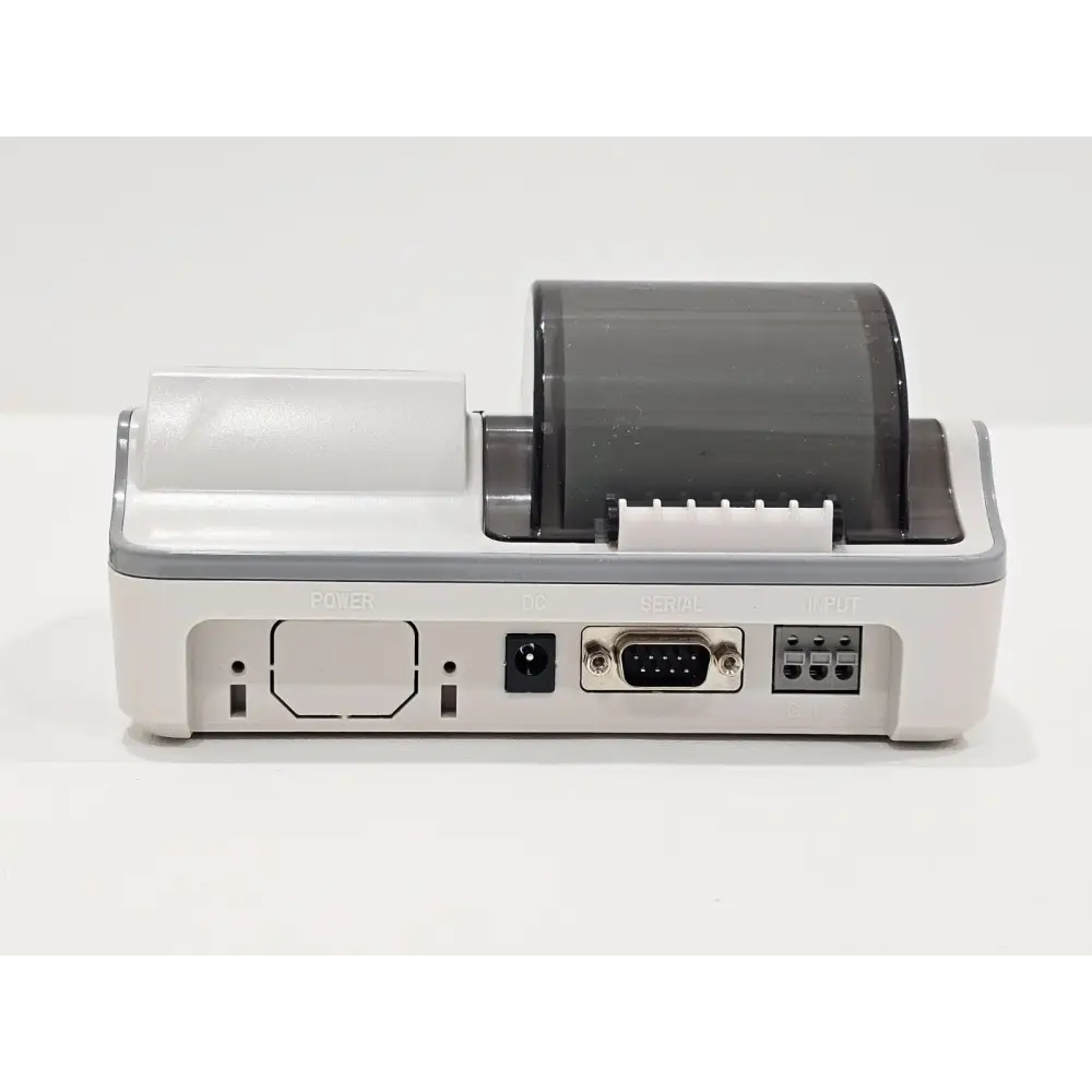 A&D AD-8127 printer close-up showing print mechanism and label output