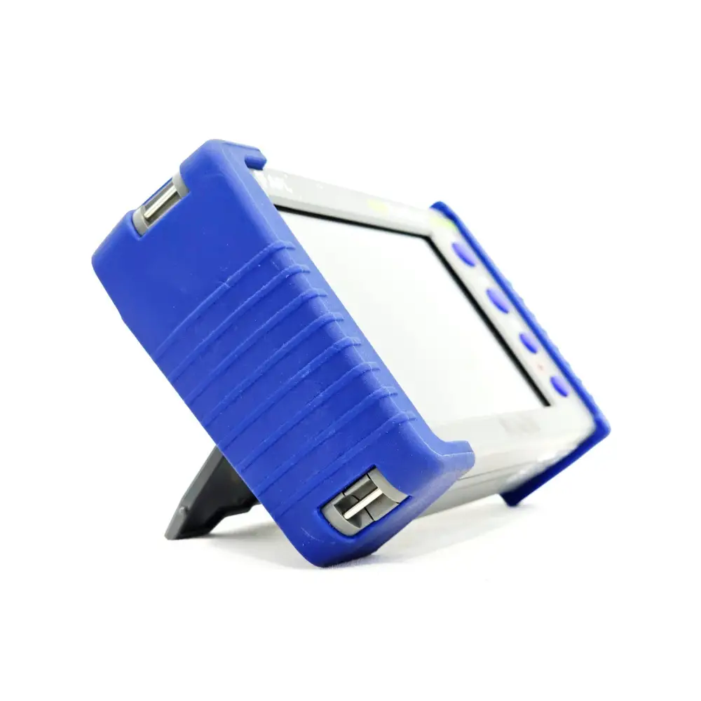 AFL FlexScan FS300-325 OTDR right-side view showing USB host port, kickstand deployed and blue rubber bumper corners