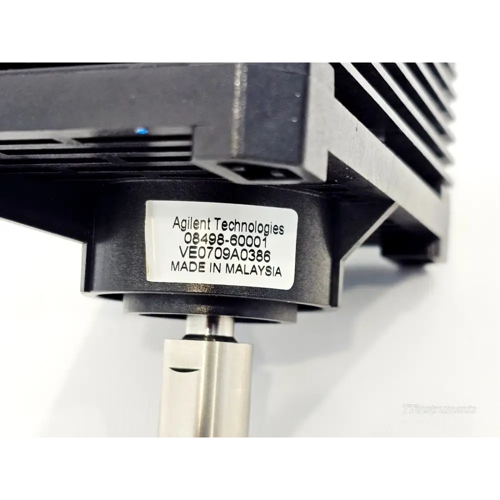 Close-up of Agilent Technologies label on 8498A attenuator showing part number 08498-60001 and Malaysia manufacture