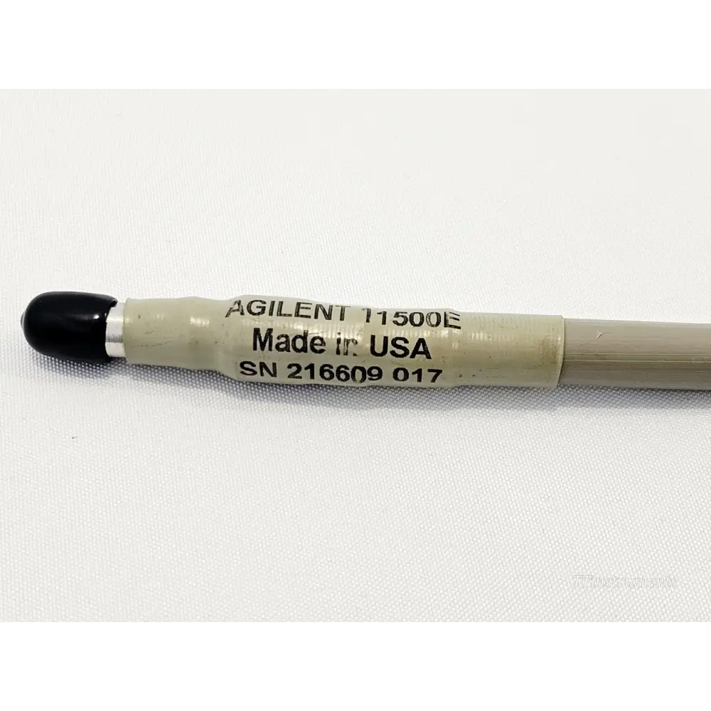 Agilent 11500E cable label showing model number, Made in USA, and serial number SN 216609 017