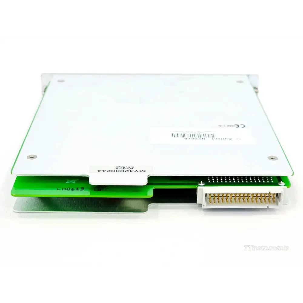 Agilent Keysight N2267A relay module — side view showing green PCB edge, card-edge backplane connector and serial label