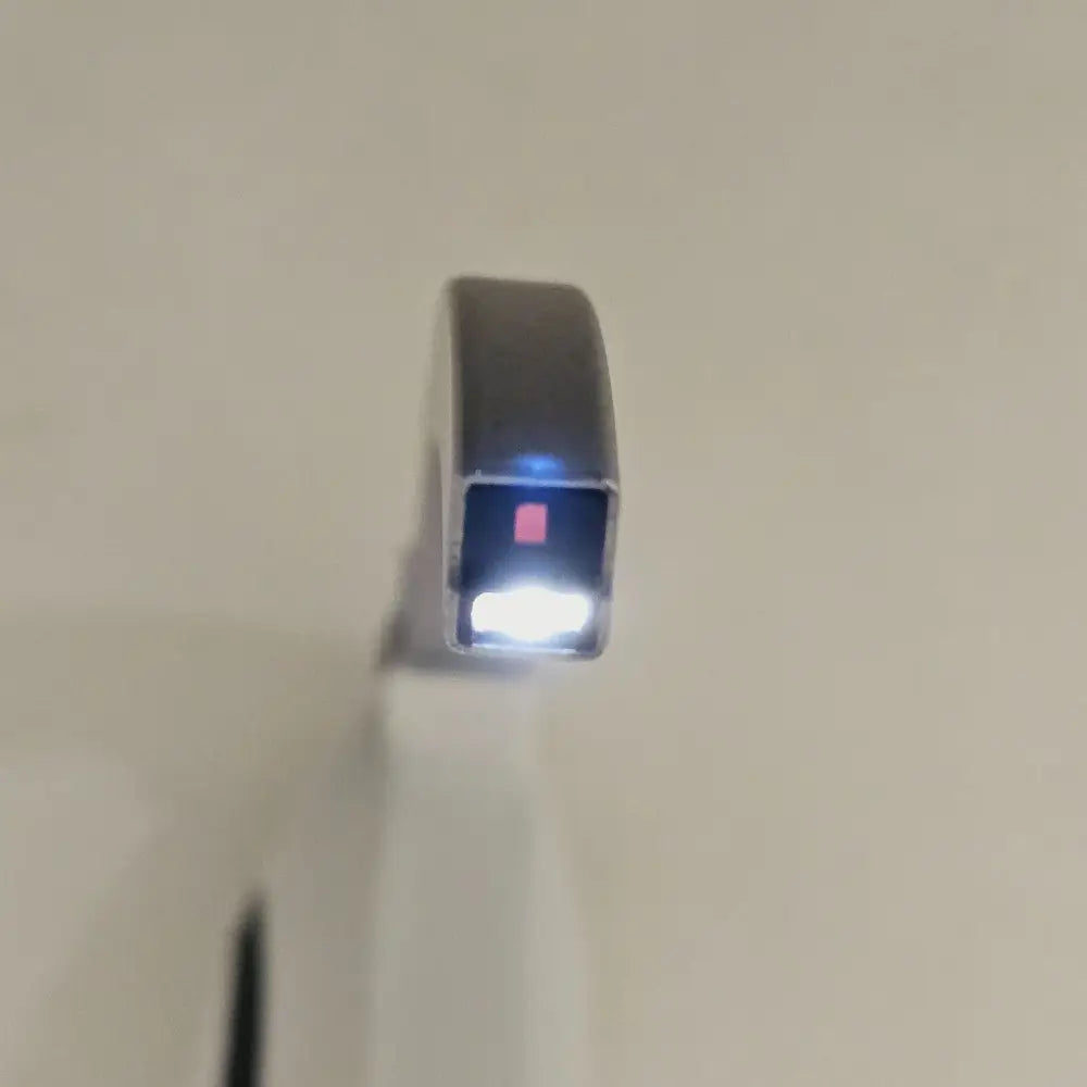 McGrath MAC video laryngoscope side profile displaying handle grip and blade attachment point