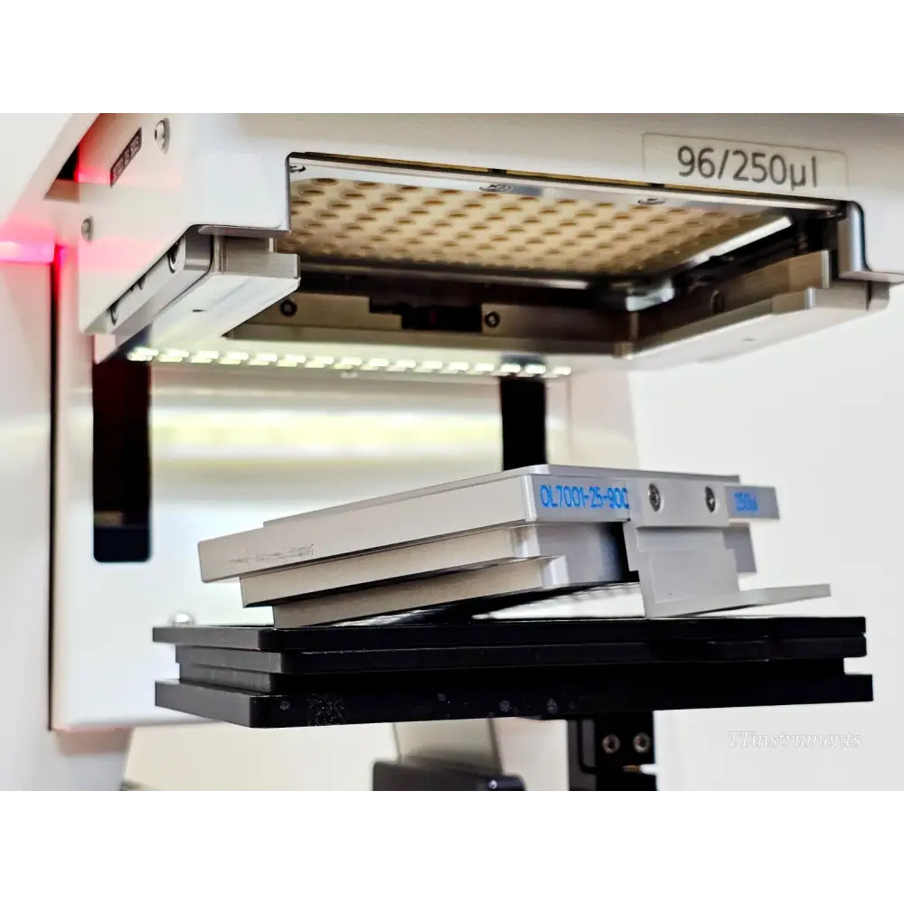 CyBio SELMA 96/250µl head raised showing OL7001-25-900 250µl dispensing plate stacked on black deck platform