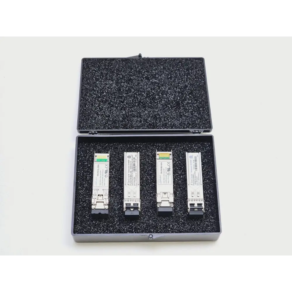 Anritsu MT1000A with MU100010A module — full kit view including cables, SFPs, bag and power adapter