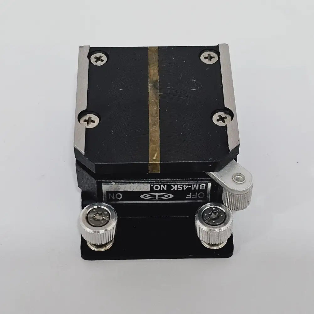 BM-45K magnetic base stand angled view showing lever switch mechanism and base contact surface