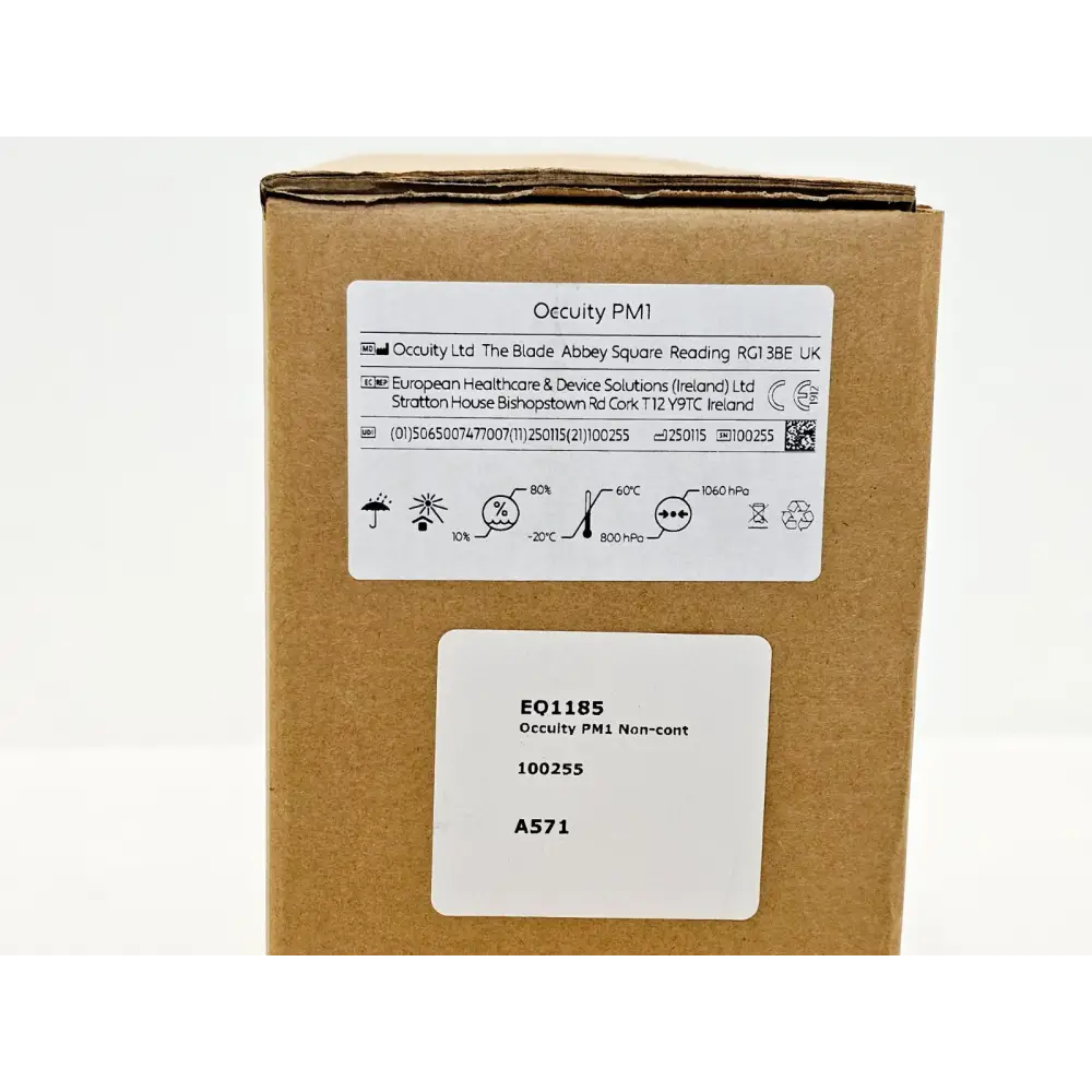Occuity PM1 pachymeter retail box label showing model name, serial number 100255, UDI, CE mark and storage conditions