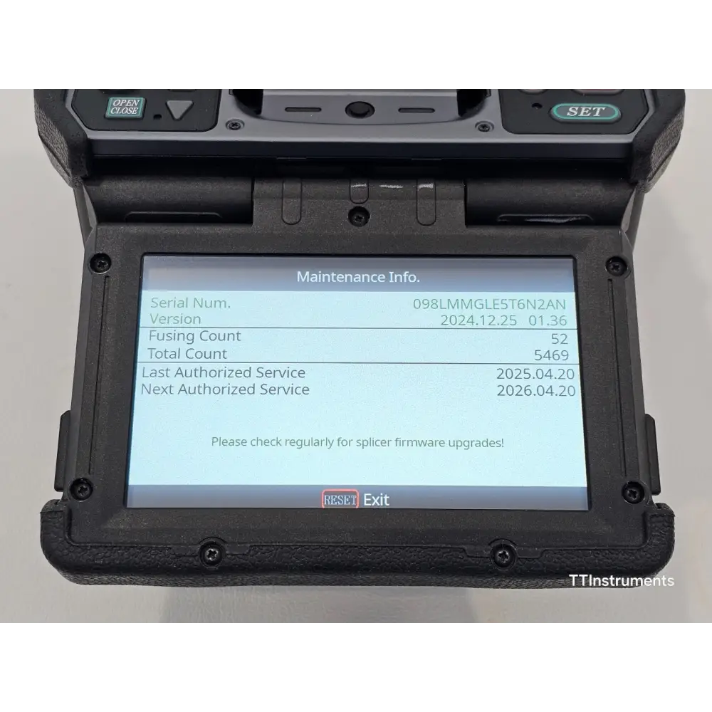 Fujikura 90S+ fusion splicer with BTR-15 battery pack, AC adapter, and hard carrying case accessories