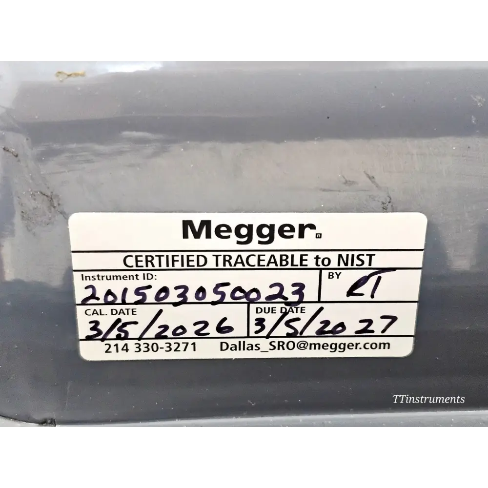 Megger MRCT calibration sticker on lid showing instrument ID 201503050023, cal date 3/5/2026, due date 3/5/2027