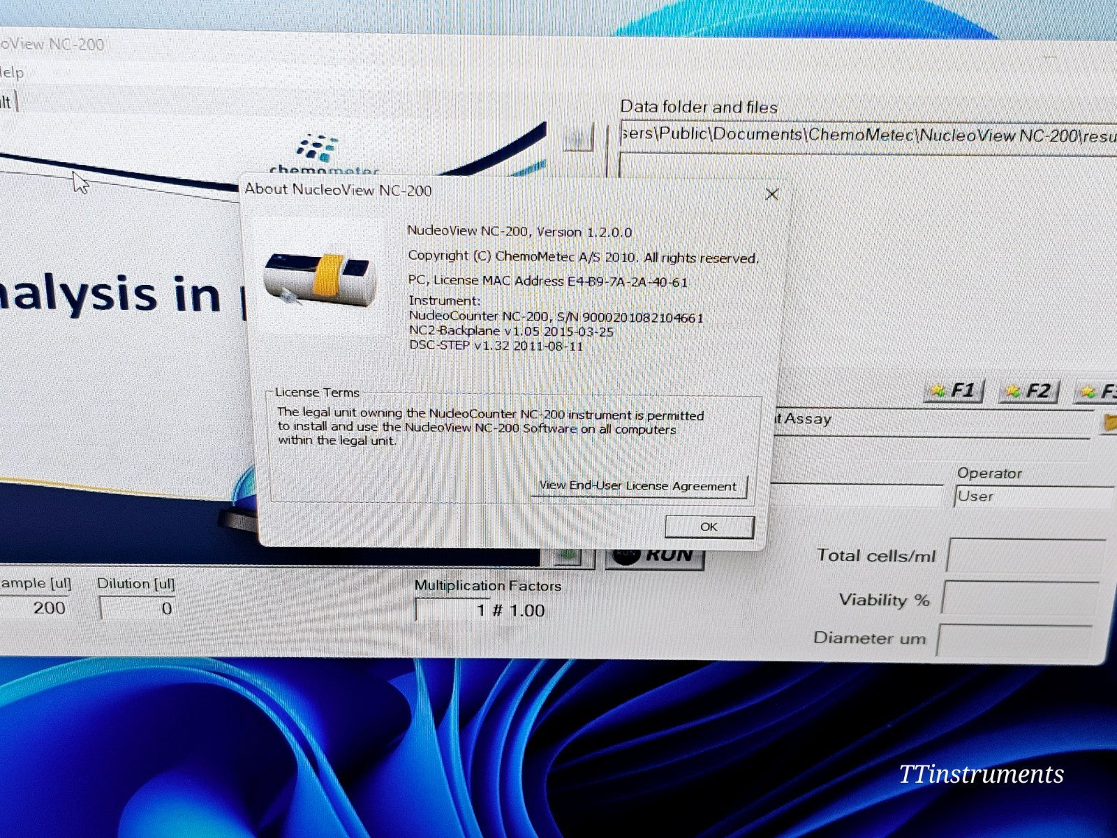 ChemoMetec NucleoCounter NC-200 and laptop shown together as complete working system