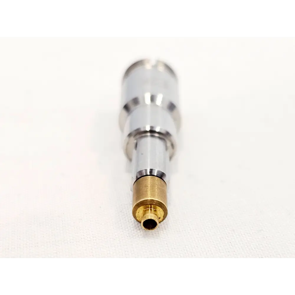 EXFO FIPT-400-E2K E-2000 UPC bulkhead adapter tip, angled close-up view showing brass ferrule opening and stainless steel stepped body