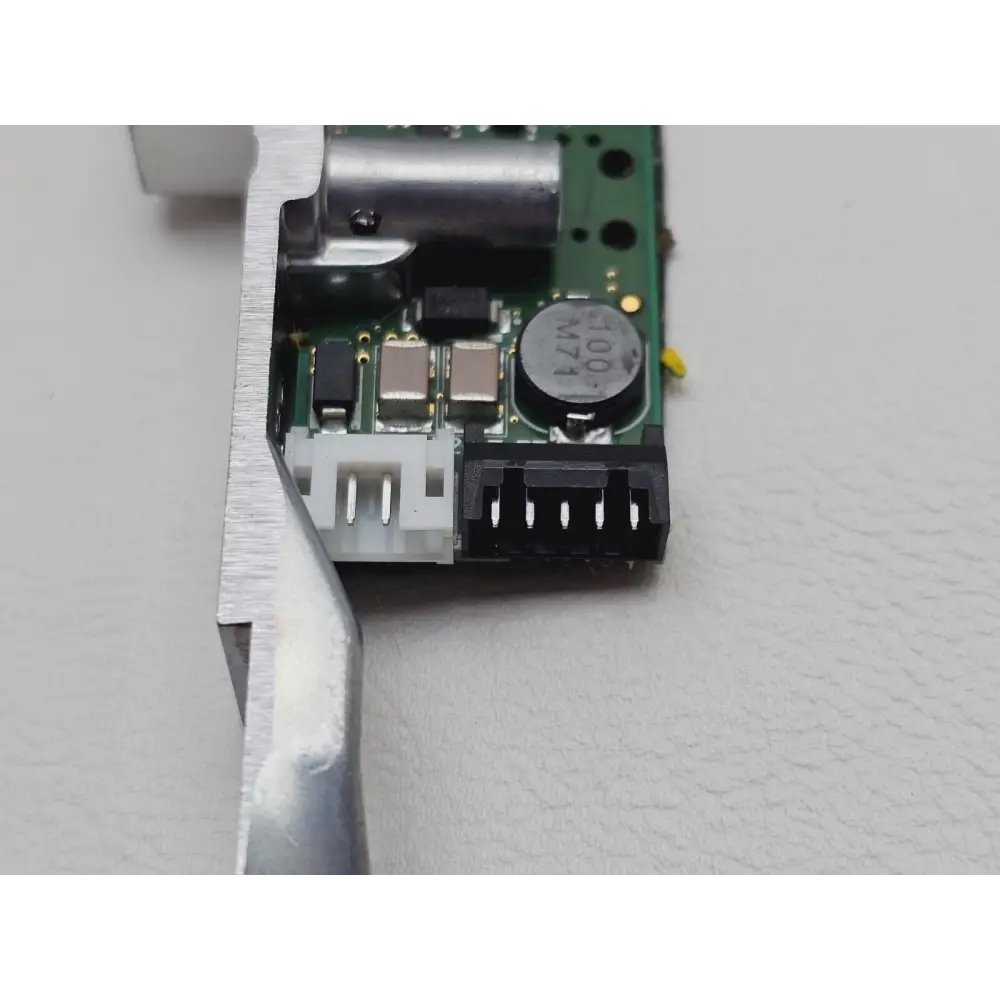 EXFO FTB-880V2 connector board power section close-up showing inductor, SMD components, and 2-pin and 4-pin power connectors