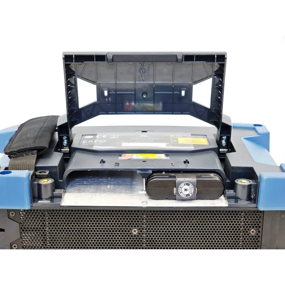 EXFO FTB-2 Pro module bay open showing fitted battery with EXFO label and module locking mechanism