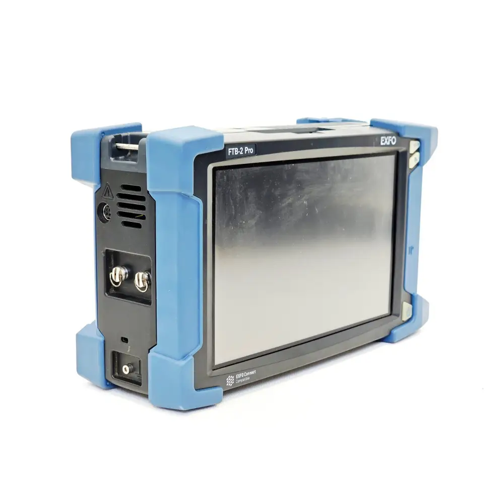 EXFO FTB-2 Pro left side panel showing module port connectors, warning label, power input and vent slots