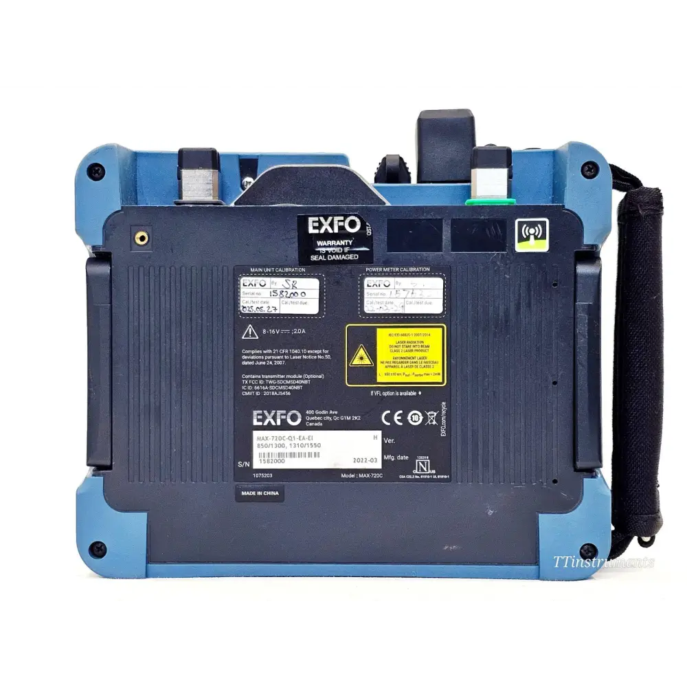 EXFO MAX-720C-Q1 rear label showing model MAX-720C, S/N 1582000, calibration stickers, 850/1300 1310/1550 nm