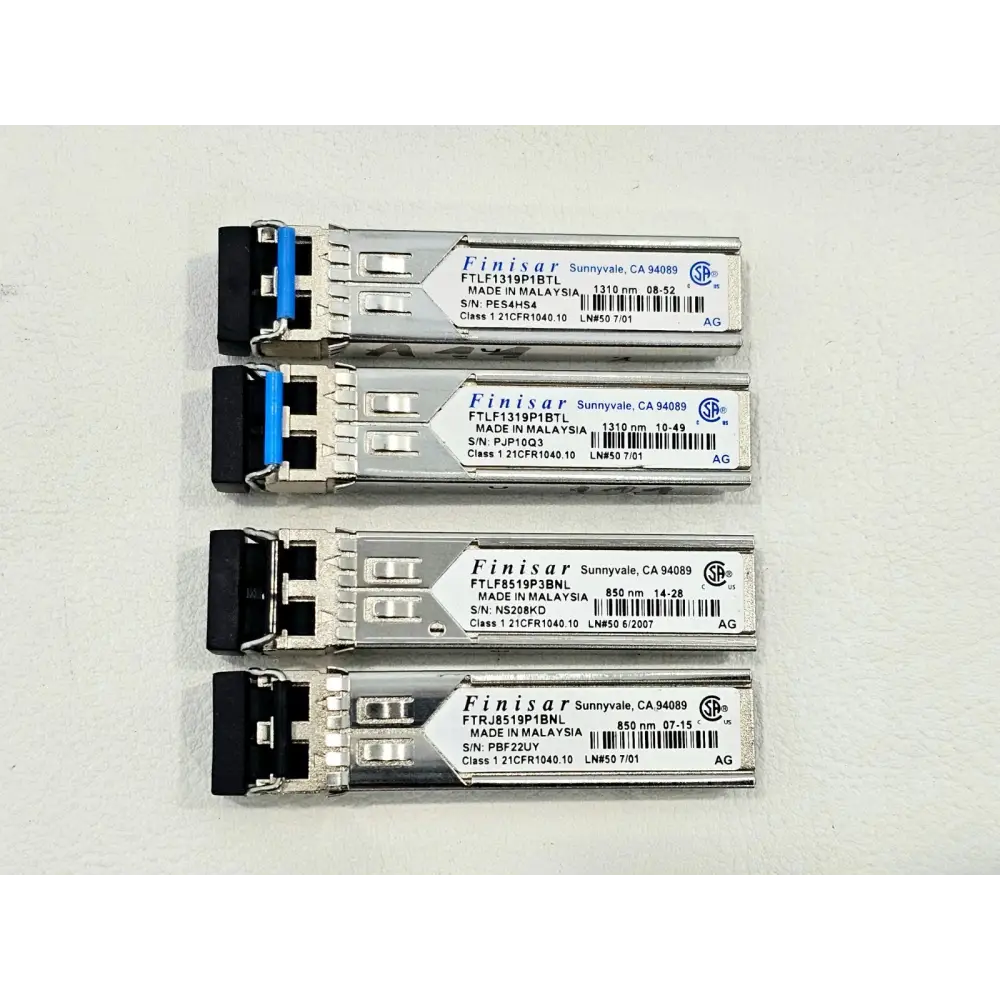 Assorted Finisar SFP transceiver modules showing variety of models in the lot