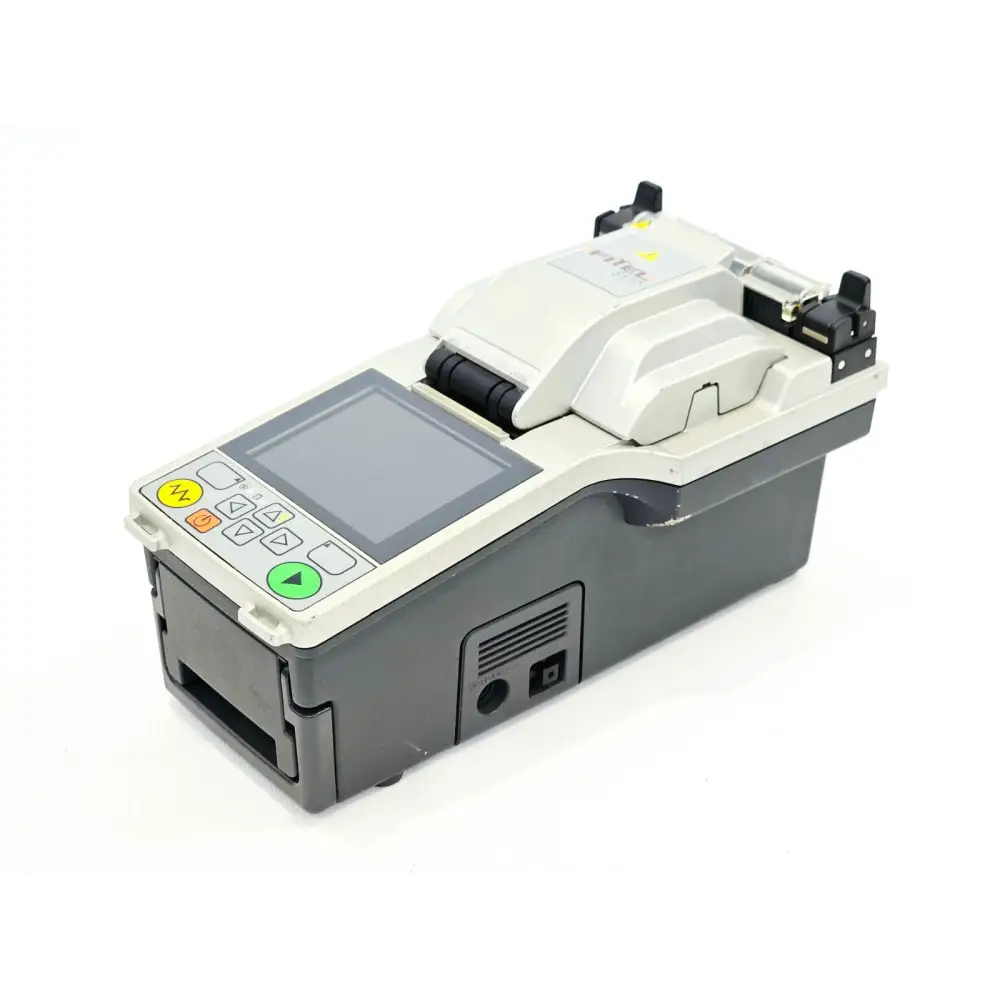 Fitel S177A fusion splicer right-side angle showing LCD display, control buttons, and DC power port