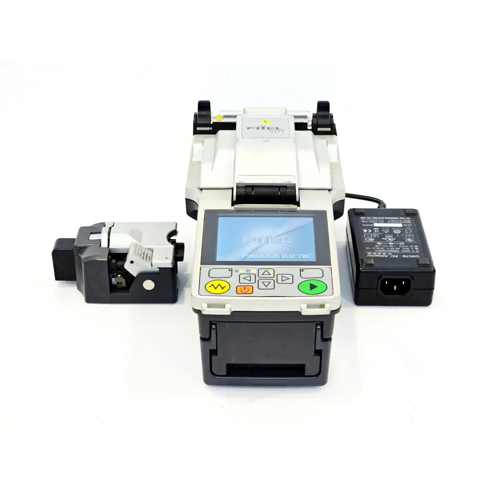 Fitel Furukawa S177A fusion splicer front view with S325A cleaver and S957B AC adapter laid out