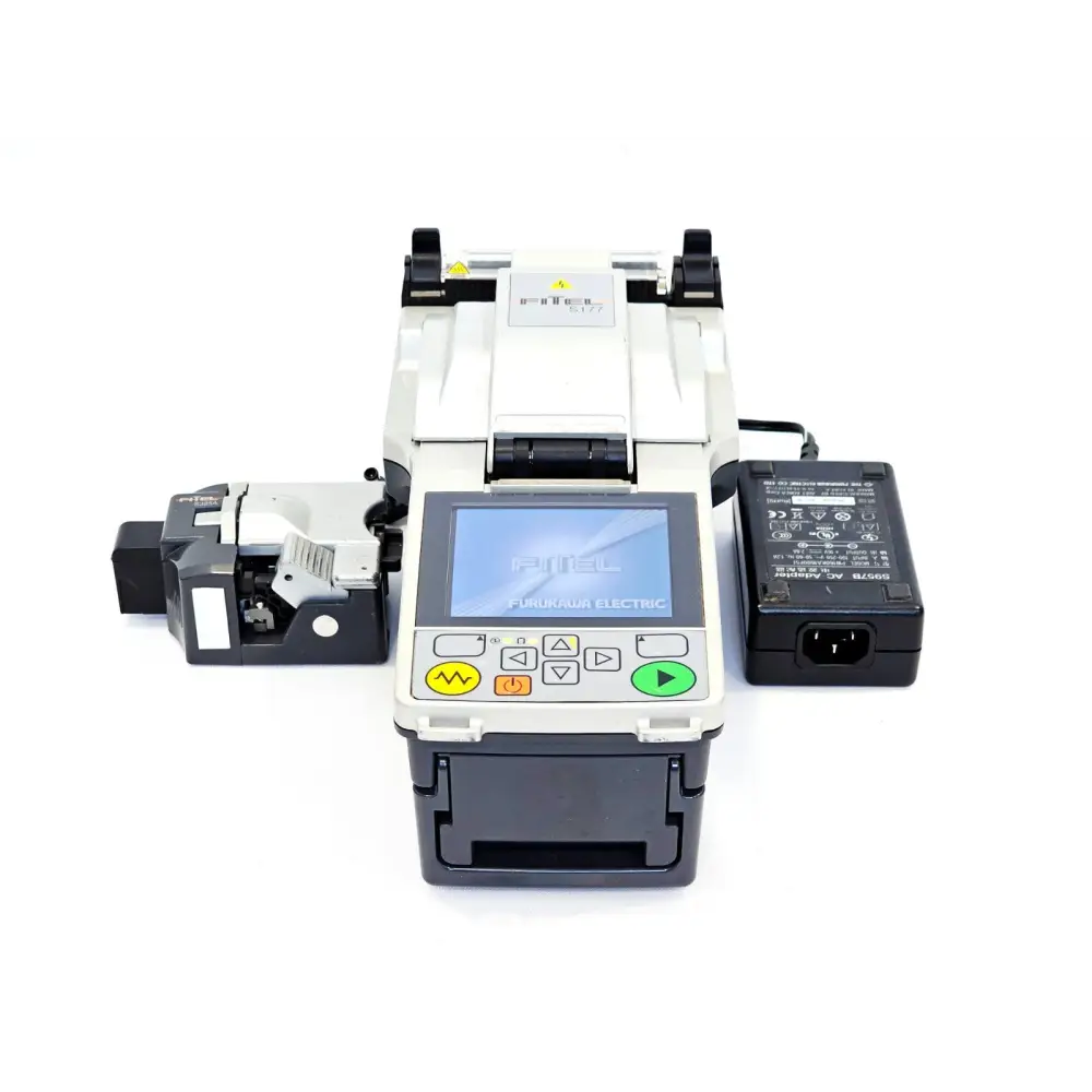 Fitel Furukawa S177A fusion splicer front view with S325A cleaver and S957B AC adapter laid out