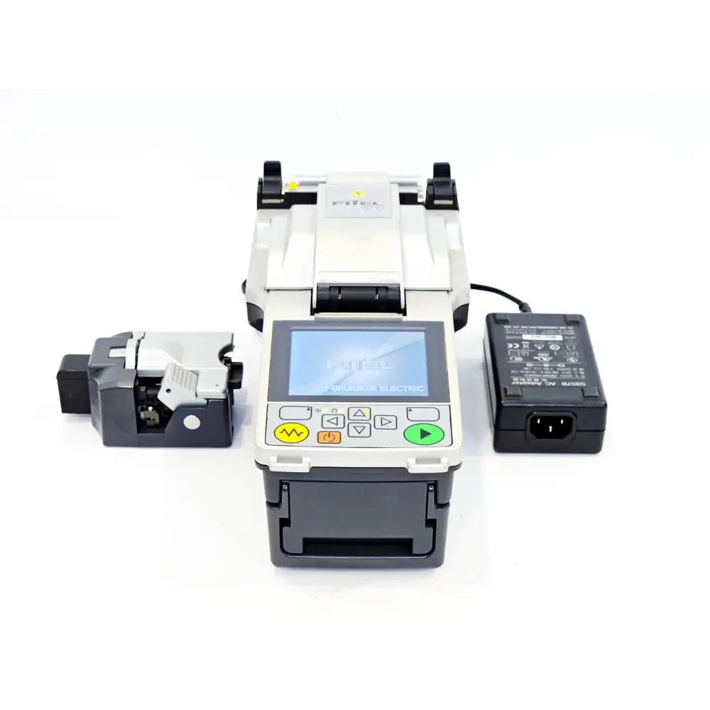 Fitel Furukawa S177A fusion splicer front view with S325A cleaver and S957B AC adapter laid out