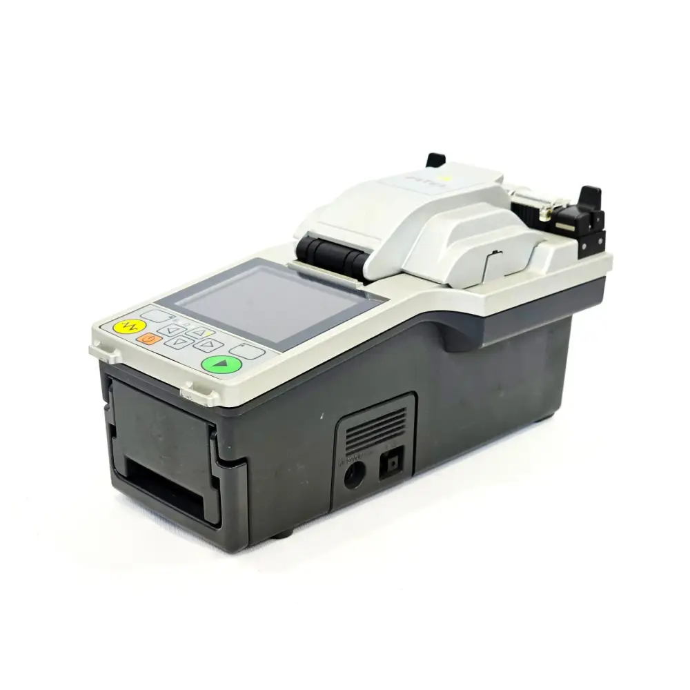 Fitel S177A fusion splicer left-side rear angle view showing power port and carry handle recess