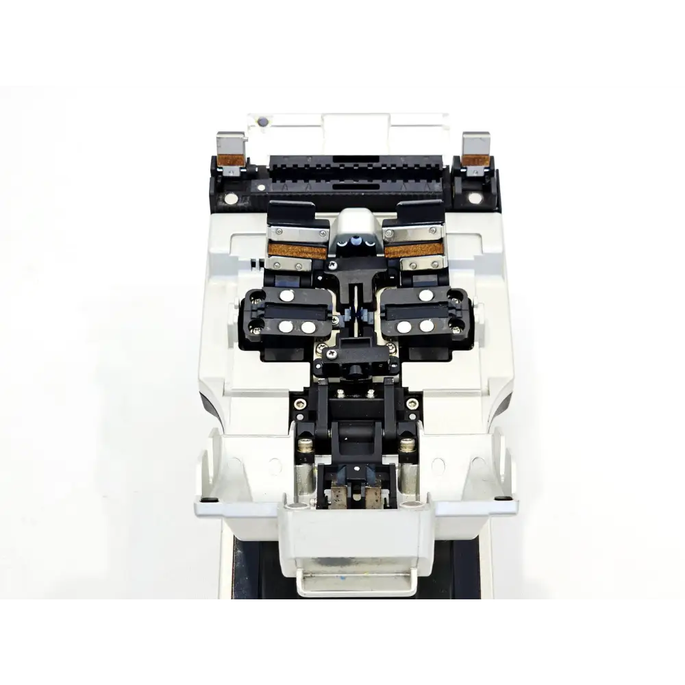 Fitel S177A fusion splicer top-down view showing V-grooves, fibre clamps and electrode assembly