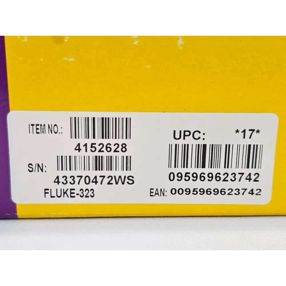 Fluke 323 clamp meter side view showing controls and CAT III 600V safety rating markings