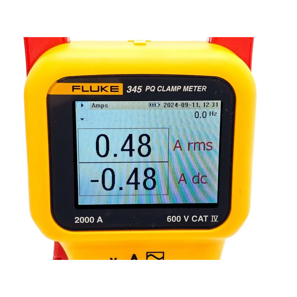 Fluke 345 clamp meter displaying harmonics bar graph on colour display