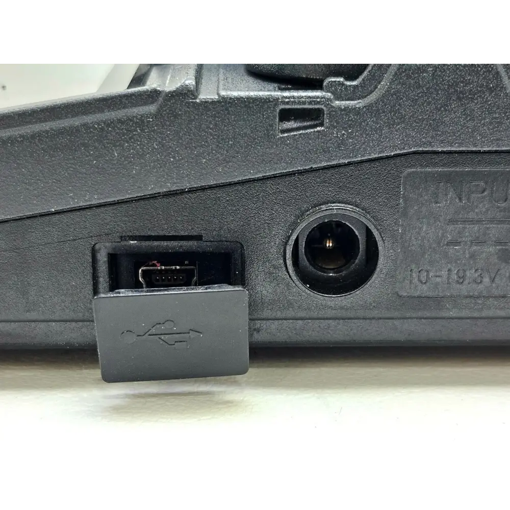 Fujikura 12S splicer mounted on work tray showing field workstation configuration